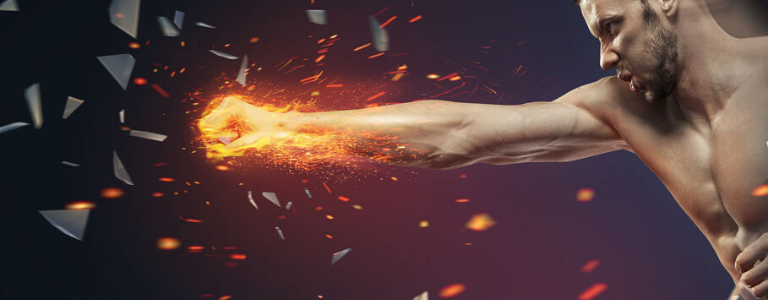 Image of boxer punching the air with fragments and fire eminating from his hand